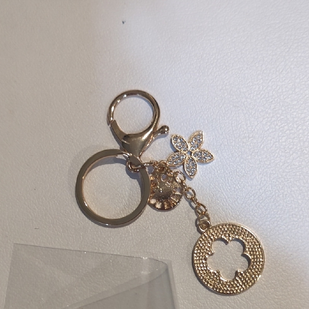 Elegant Gold Keychain with Floral Charm
